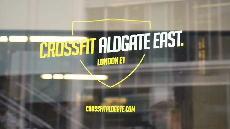 The Crossfit Aldgate East logo on the front of the door of the gym